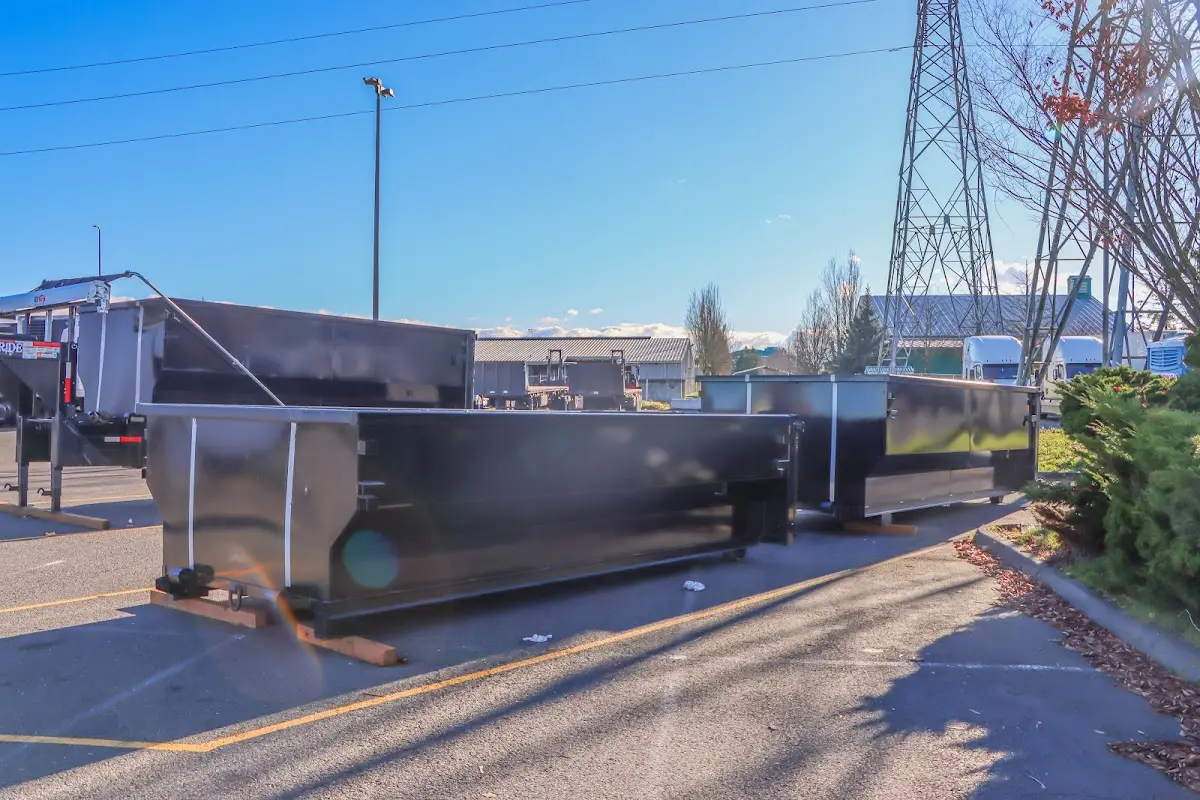 Roll-off dumpster ready for waste disposal at job site for 15 Yard Dumpster Rental in Chain Lake